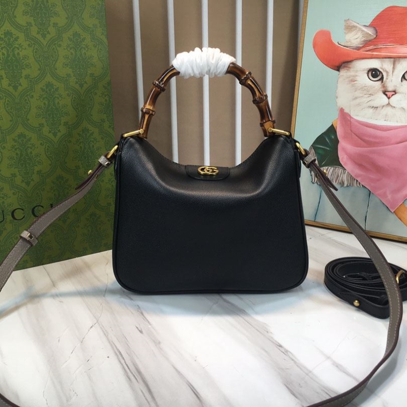 G*u*i top handle bags